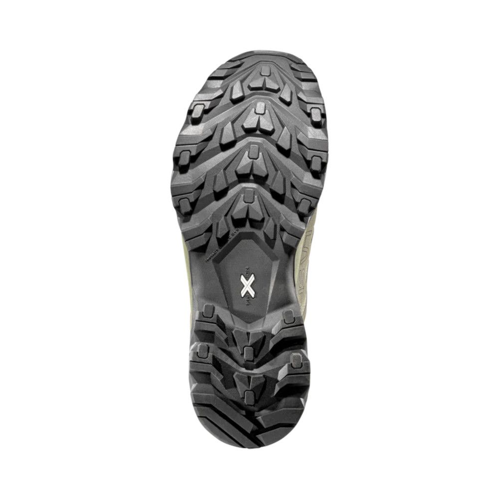 Aggressive trail shoe outsole with deep multi-directional lugs and an X logo in the midfoot area.