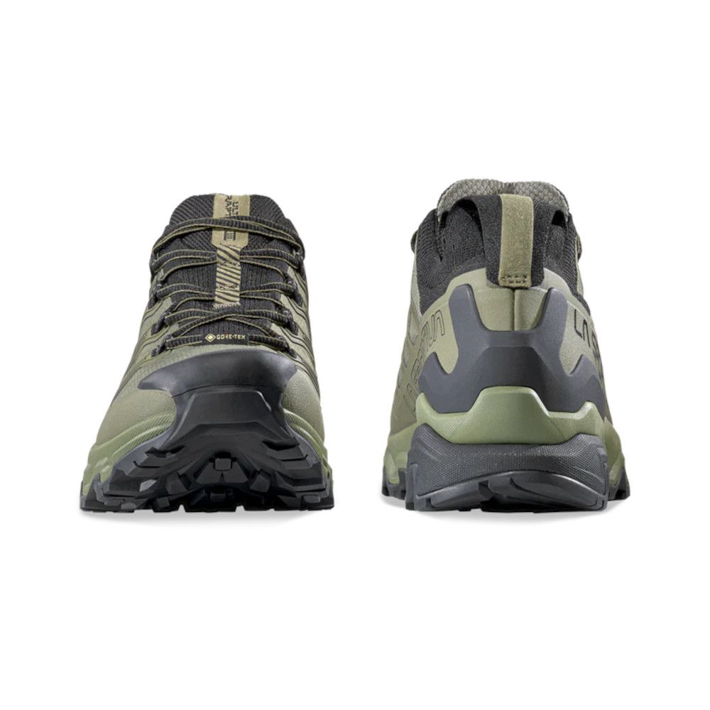 Olive-green rugged hiking shoes shown from front and rear, with sturdy tread and reinforced toe area for outdoor use.