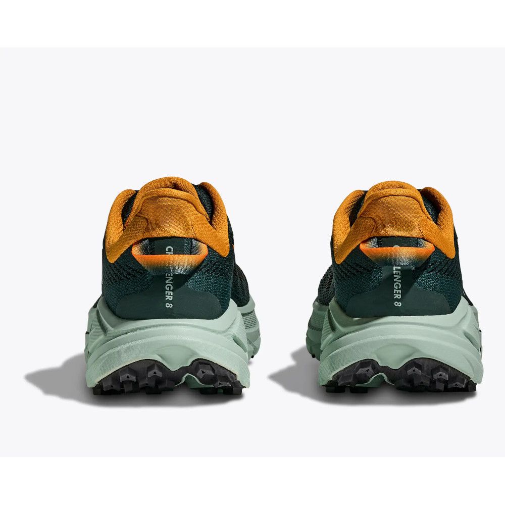Back view of two teal running shoes with orange heel tabs and mint green soles, side by side on a white background.