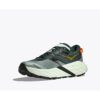 Green and gray trail running shoe with a chunky off-white sole and orange pull tab on back