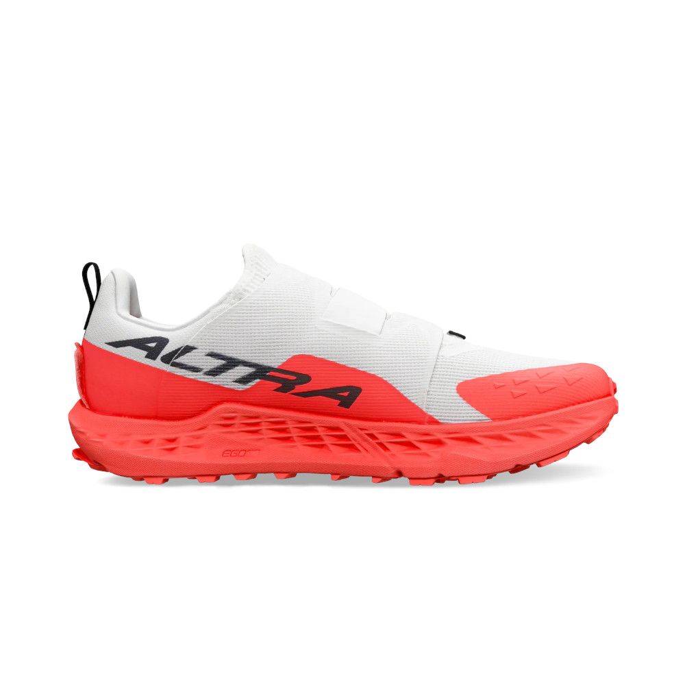 White and coral Altra trail running shoe with breathable mesh upper and thick coral sole, side logo visible on the midfoot area