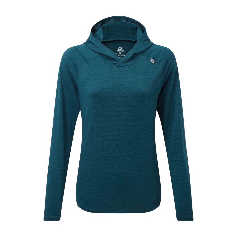 Teal long-sleeve hooded athletic top with a small logo badge near the neckline on a white background.