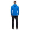 Rear view of a person wearing a royal blue hoodie and black pants on a white background (back view).