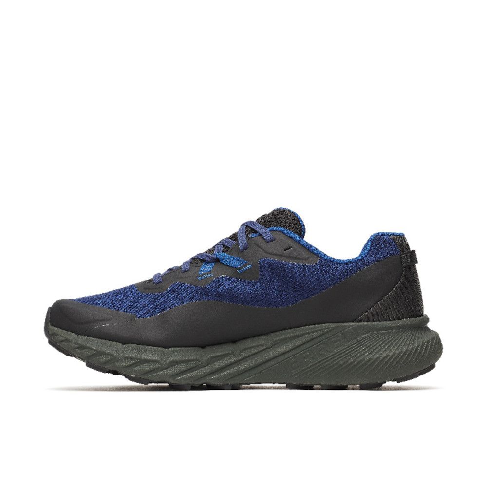 Blue and black athletic sneaker with a thick olive-green sole, shown in side view from a low angle for product detail to highlight design and materials.