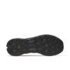Black Merrell trail shoe outsole with deep lugs and blue Merrell logo on the midfoot area.