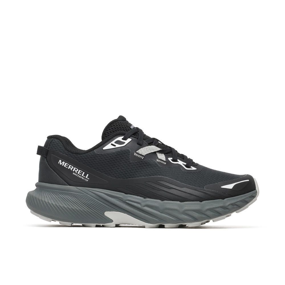 Black Merrell waterproof running shoe with thick gray sole and rugged tread, side view.