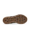 Bottom view of a brown Merrell hiking shoe outsole with rugged, lattice-like tread patterns.
