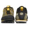 Olive and black outdoor hiking shoes with yellow laces and pull tabs, shown from the front and rear to highlight design and grip.