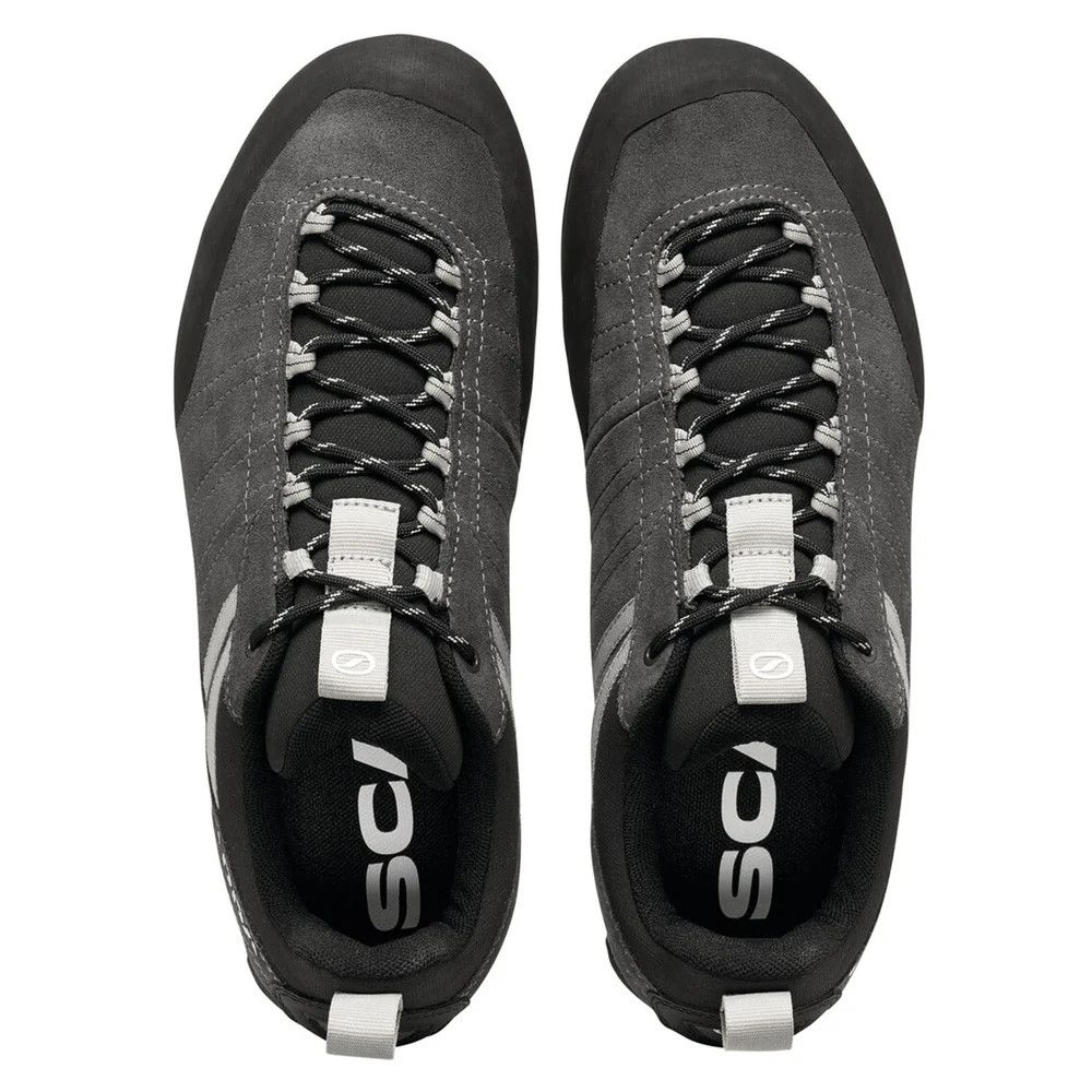 1_43c614ff-305c-487c-b528-744a22aa94cf Top-down view of a pair of dark gray hiking shoes with black laces and white pull tabs, shown from above with visible brand on the insoles.