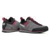1_43c614ff-305c-487c-b528-744a22aa94cf Grey Scarpa hiking shoe pair with pink accents and black toe cap, side view showing laces and treaded outsole