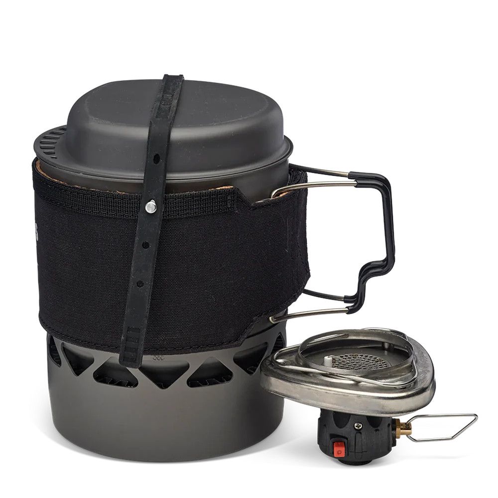 1_43c614ff-305c-487c-b528-744a22aa94cf Compact camping stove with a metal pot strapped above and a black fabric sleeve around the burner for carrying.