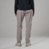 1_43c614ff-305c-487c-b528-744a22aa94cf Back view of a person wearing light gray loose-fit pants and white sneakers against a neutral backdrop