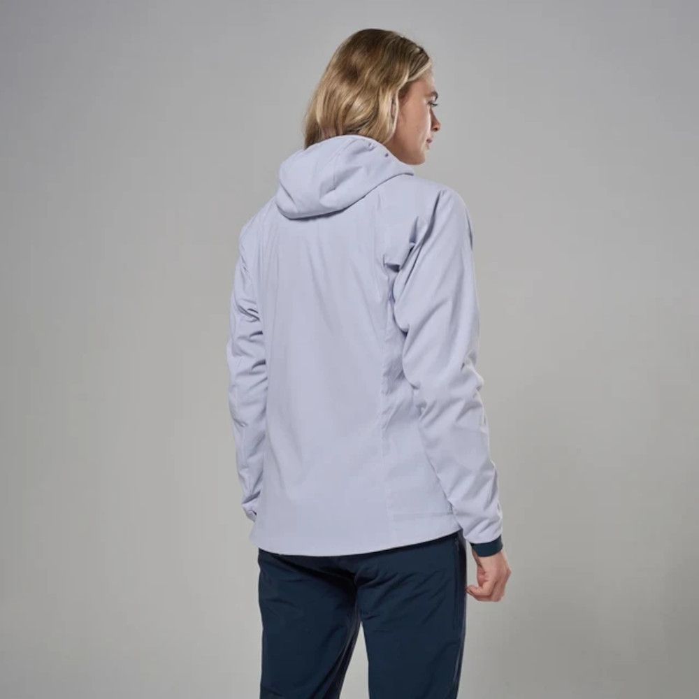 1_43c614ff-305c-487c-b528-744a22aa94cf Person seen from behind wearing a light gray hooded jacket and dark pants in a neutral studio setting.