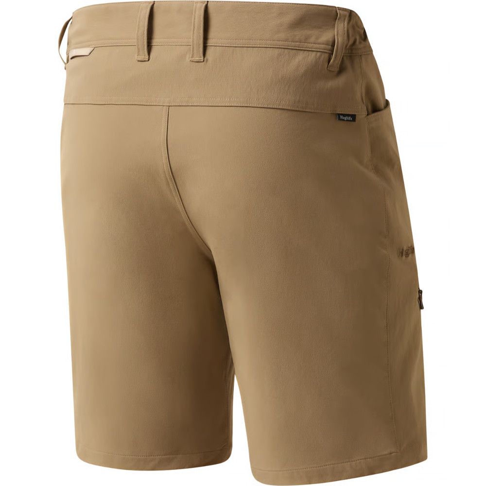 MKLPR_ECL_P_1_square_b214d799-76b2-4a64-a0ae-a2325d30818b_640x Tan hiking shorts viewed from the back, showing belt loops and rear pocket with a small Haglöfs tag