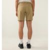 Back view of a person wearing tan chino shorts, white socks, and black sneakers.