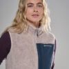 FCXTV_OYS_A_4_square_5e02e667-e788-4a68-828e-384d055045ba_640x Portrait of a woman wearing a cream fleece vest with a navy zip panel and Montane logo on the chest, against a gray background.