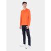 MKLPR_ECL_P_1_square_b214d799-76b2-4a64-a0ae-a2325d30818b_640x Male model wearing a bright orange long-sleeve athletic shirt with navy jogger-style pants and white sneakers, standing against a neutral backdrop.
